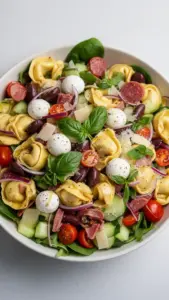 Colorful Tortellini Pasta Salad with fresh vegetables and dressing